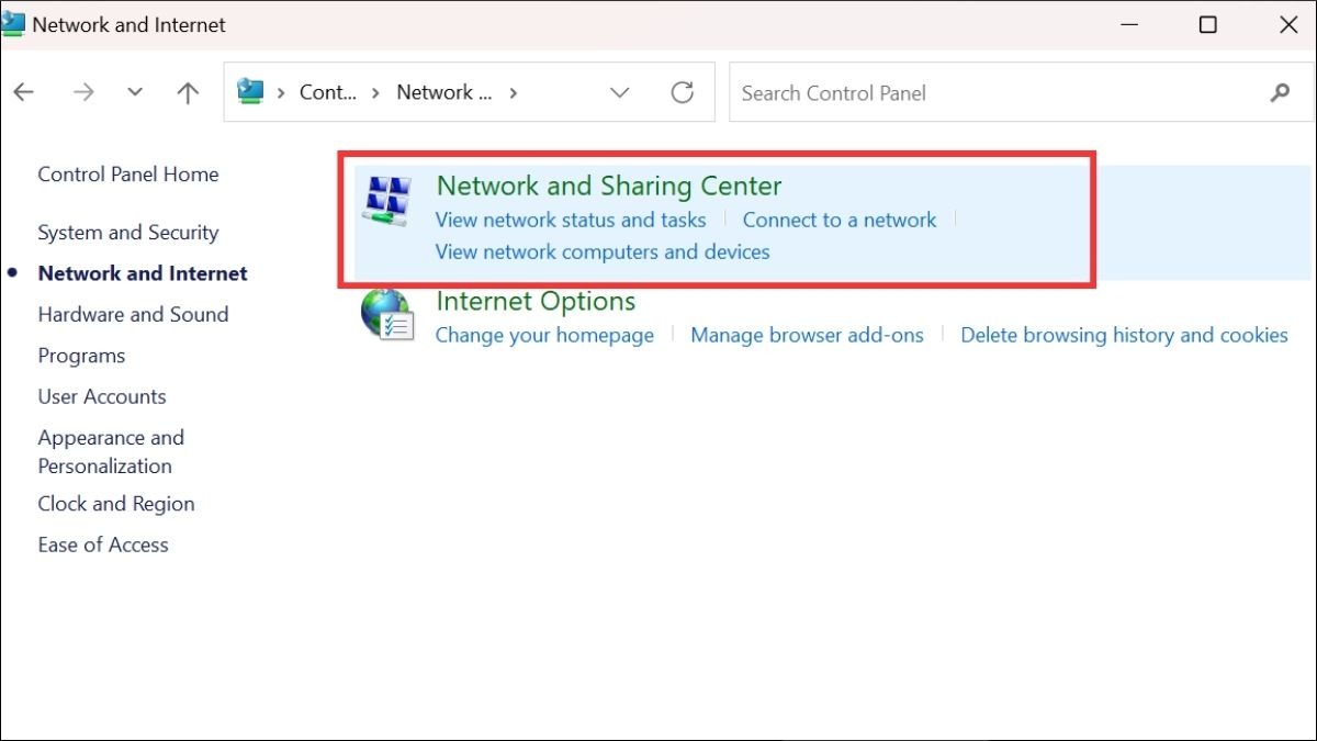 Click vào Network and Sharing Center
