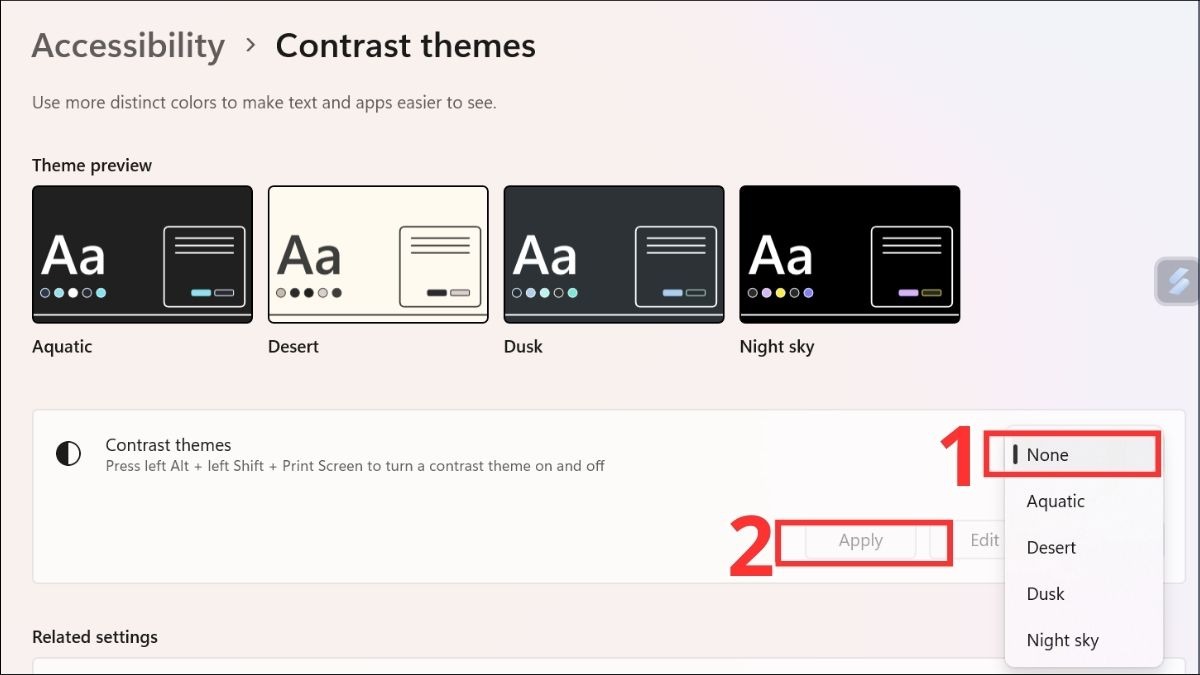 Tại mục Contrast theme, chọn None và nhấn Apply để áp dụng thay đổi