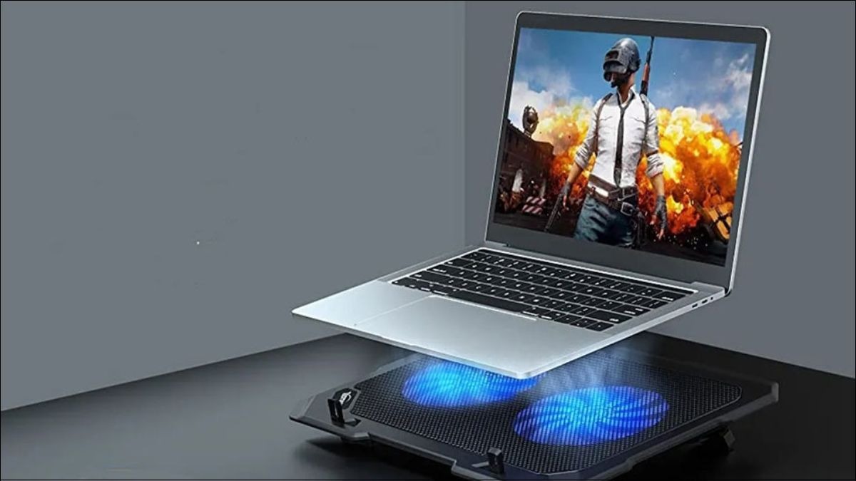 Sử dụng đế tản nhiệt để làm giảm nhiệt độ của máy 