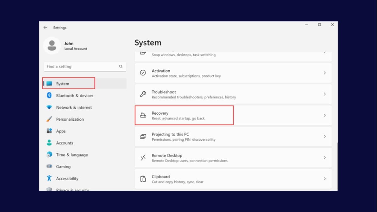 Chọn mục System và Recovery