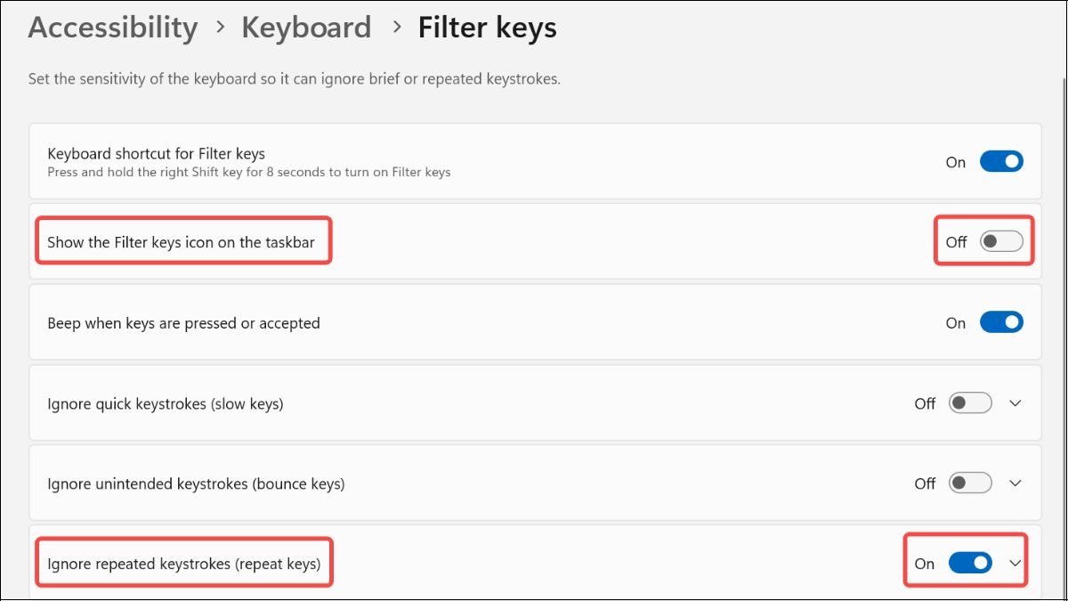 Bỏ tích ở Show the Filter Keys icon on the taskbar