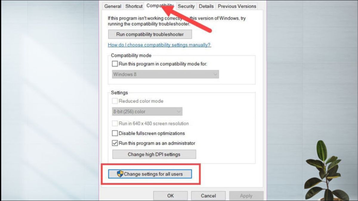 Chọn Compatibility > Change settings for all users