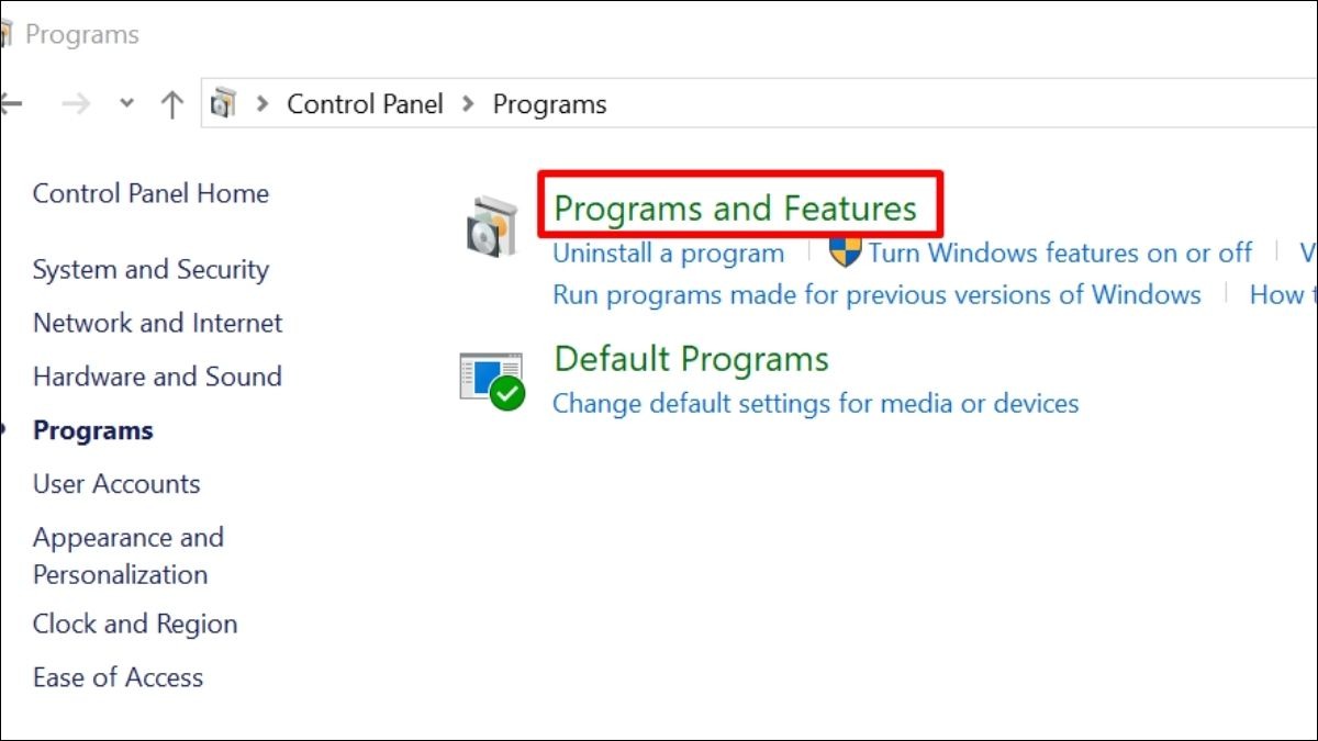 Mở Control Panel -> Programs -> Programs and Features