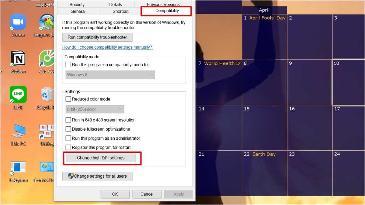 Click vào Change high DPI settings