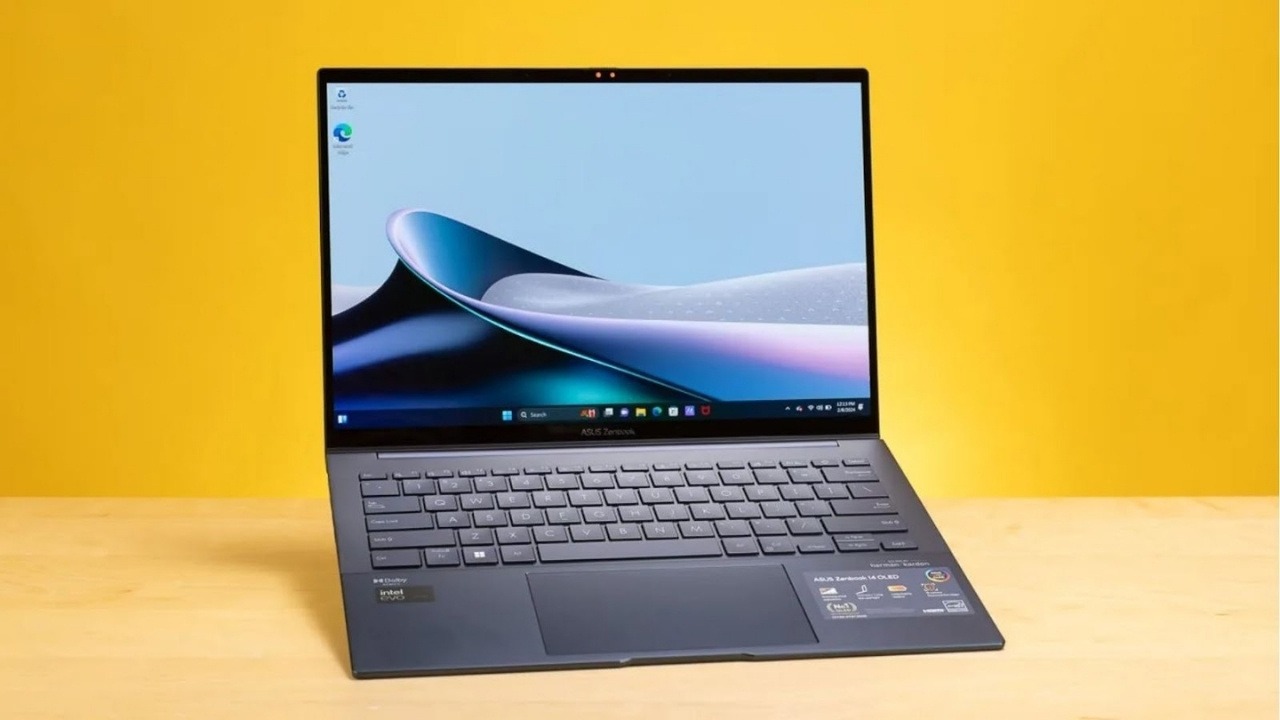 Zenbook 14 2026 là laptop AI mỏng nhẹ toàn diện với màn OLED, vỏ bền và pin lâu