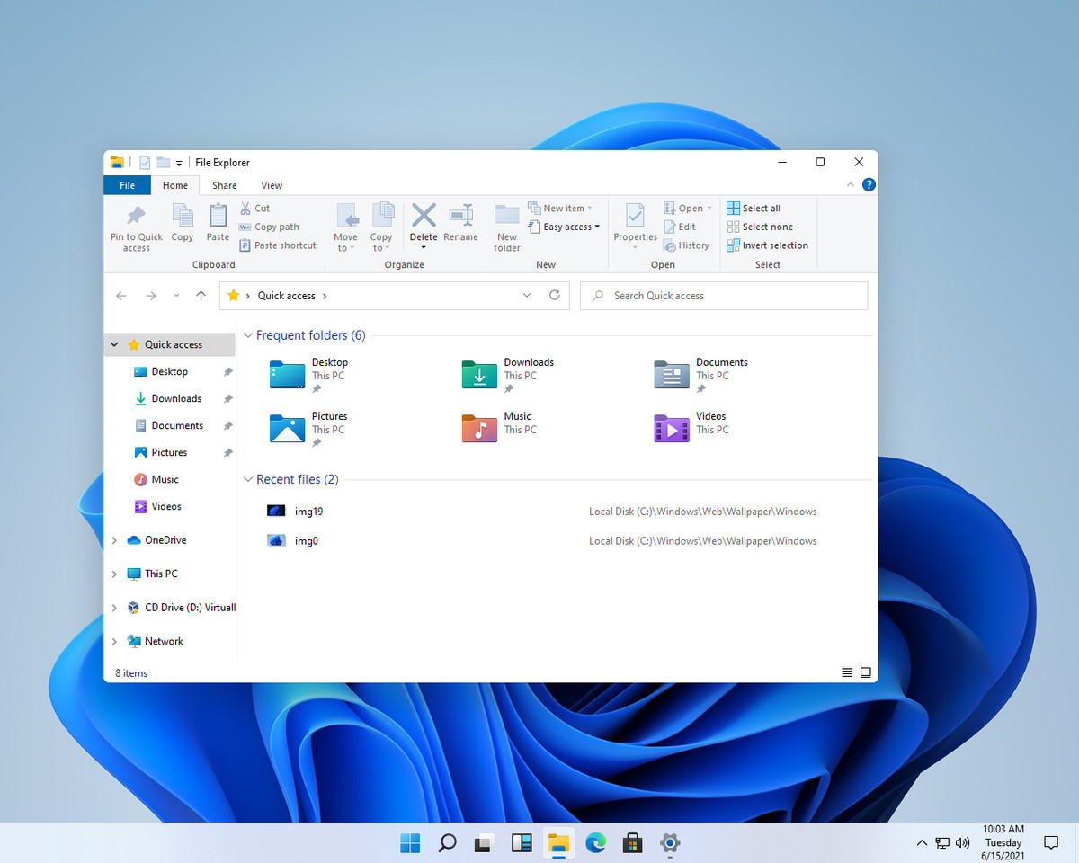 Giao diện Windows 11 với các icon bo tròn, nhiều màu sắc và tính năng chia màn hình thông minh